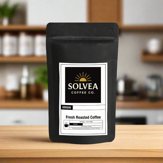 Black coffee bag with Solvea Coffee Co. label on a kitchen counter