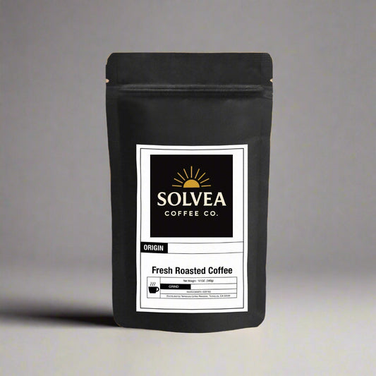 Black coffee bag with Solvea Coffee Co. label on a white background
