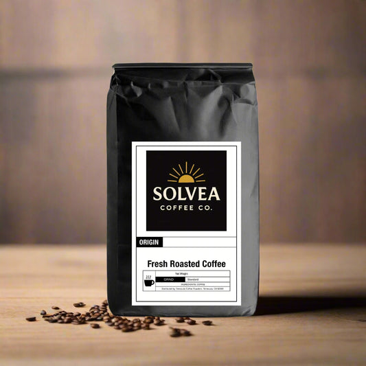 Black coffee bag with Solvea Coffee Co. label on a brown background